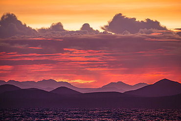 Intense clouds and sunset over Baja Peninsula from Isla Ildefonso, Baja California Sur, Mexico, North America