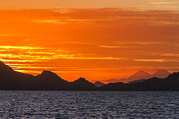 Sunset over Komodo National Park, Rinca Island, Flores Sea, Indonesia, Southeast Asia, Asia