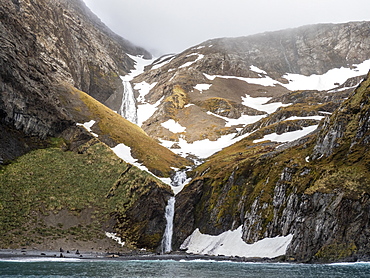 Glacier and meltwater waterfall in Hercules Bay, South Georgia, Polar Regions