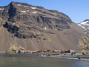 Rusting machinery and buildings at the abandoned whaling station at Stromness Harbor, South Georgia, Polar Regions