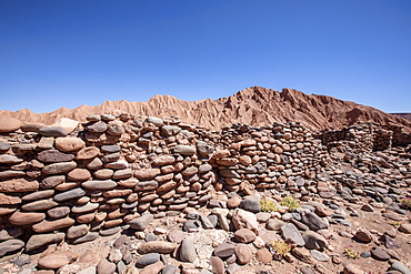 Remnants of rock structures in Tambo de Catarpe, Catarpe Valley in the Atacama Desert, Chile, South America