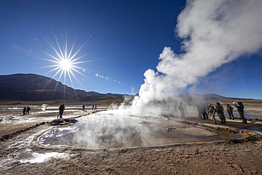 Tourists at the Geysers del Tatio (El Tatio), the third largest geyser field in the world, Andean Central Volcanic Zone, Antofagasta Region, Chile, South America