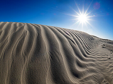 Wind swept barkhan sand dunes on the barrier island of Isla Magdalena, Baja California Sur, Mexico, North America