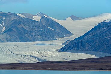 Tidewater glaciers and ice-capped mountains in Eclipse Sound, Nunavut, Canada, North America