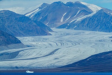 Tidewater glaciers and ice-capped mountains in Eclipse Sound, Nunavut, Canada, North America