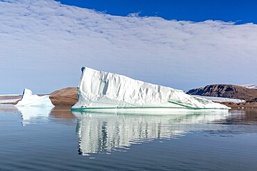 Grounded icebergs calved from nearby glacier in Makinson Inlet, Ellesmere Island, Nunavut, Canada, North America