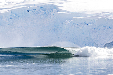 A massive series of waves formed after a huge calving event from the glacier in Neko Harbor, Antarctica, Polar Regions