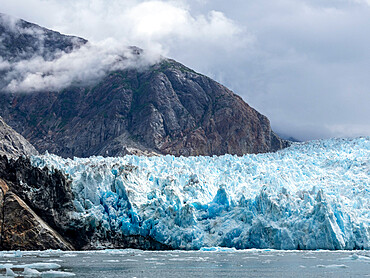 Retreating tidewater South Sawyer Glacier meets the rock, Tracy Arm, Southeast Alaska, United States of America, North America