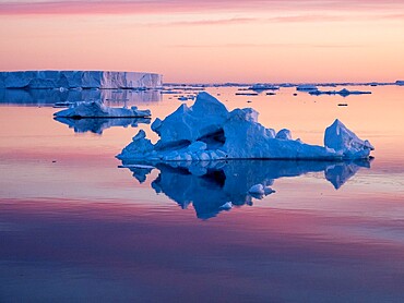 Sunset over tabular and glacial ice near Snow Hill Island, Weddell Sea, Antarctica, Polar Regions