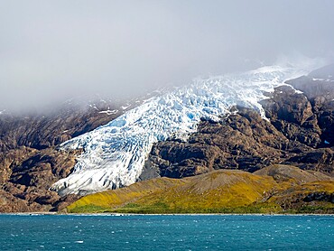 Ice and snow covered mountains with glaciers in King Haakon Bay, South Georgia, South Atlantic, Polar Regions