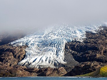 Ice and snow covered mountains with glaciers in King Haakon Bay, South Georgia, South Atlantic, Polar Regions