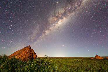 The Milky Way over termite mounds in Cape Range National Park, Exmouth, Western Australia, Australia, Pacific