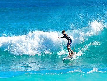 Surfer riding a wave at Ningaloo Reef, Western Australia, Australia, Pacific