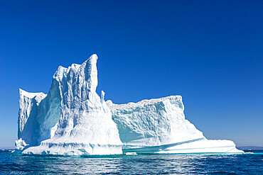 Huge icebergs from the Ilulissat Icefjord stranded on a former terminal moraine in Ilulissat, Greenland, Denmark, Polar Regions