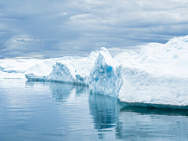 Huge icebergs from the Ilulissat Icefjord stranded on a former terminal moraine just outside Ilulissat, Greenland, Denmark, Polar Regions