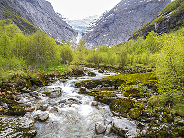 Stream from the melting of the Briksdal glacier, one of the best known arms of the Jostedalsbreen glacier, Vestland, Norway, Scandinavia, Europe