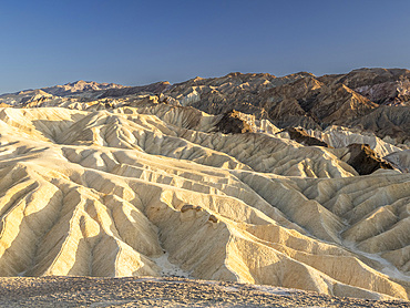 A view of Zabriskie Point at sunset, Amargosa Range, Death Valley National Park, California, United States of America, North America