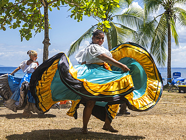 A group of young Costa Rican dancers in traditional dress perform at Playa Blanca, El Golfito, Costa Rica, Central America