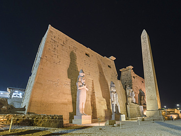 The Luxor Temple at night, a large Ancient Egyptian temple complex constructed approximately 1400 BCE, Luxor, UNESCO World Heritage Site, Luxor, Thebes, Egypt, North Africa, Africa