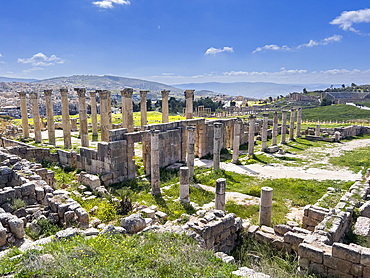 Columns frame a building in the ancient city of Jerash, believed to be founded in 331 BC by Alexander the Great, Jerash, Jordan, Middle East