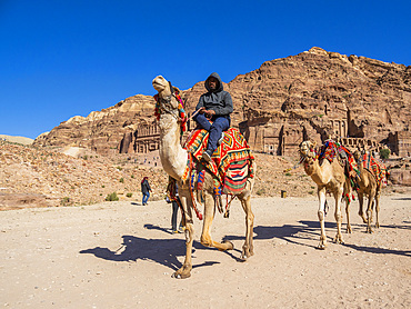 Camel and rider, Petra Archaeological Park, UNESCO World Heritage Site, one of the New Seven Wonders of the World, Petra, Jordan, Middle East