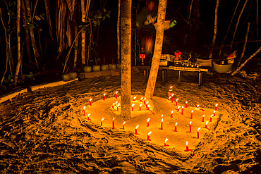 Special dinner served by locals from the dive resort at Pulau Panaki, Raja Ampat, Indonesia, Southeast Asia, Asia