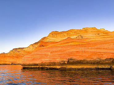 Sandstone cliff formations at sunrise on Isla San Jose, Baja California Sur, Sea of Cortez, Mexico, North America