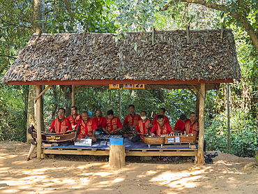 Survivors of the Khmer Rouge play together at Banteay Srei Temple in the area of Angkor, Cambodia, Indochina, Southeast Asia, Asia