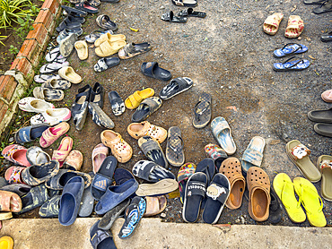 Shoes belonging to school children at the Green School in Kampong Tralach, Cambodia, Indochina, Southeast Asia, Asia