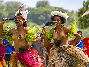 Six different groups of native warriors, drummers, and dancers perform on Kwato Island, Papua New Guinea, Pacific