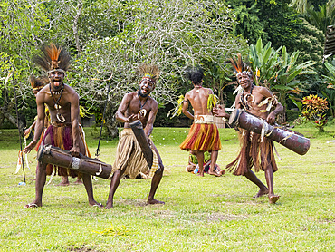 Six different groups of native warriors, drummers, and dancers perform on Kwato Island, Papua New Guinea, Pacific