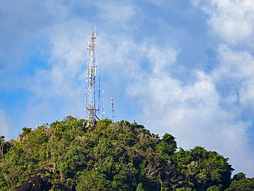 A modern cell tower amongst the thick foliage, Palau, Micronesia, Pacific