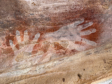 Wandjina art form of hands found in quartzite sandstone cliffs on Bigge Island, Kimberley, Western Australia, Australia, Pacific