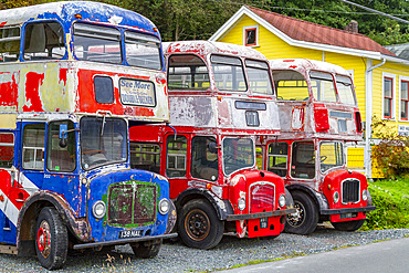 London double-decker buses in the First Nations Kwakwaka'wakw people's town of Alert Bay, British Columbia, Canada, North America