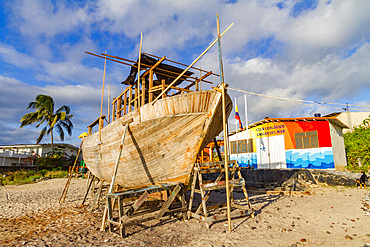 View of boat being built in a boatyard in the port town of Puerto Baquerizo Moreno, San Cristobal Island, Galapagos Islands, UNESCO World Heritage Site, Ecuador, South America