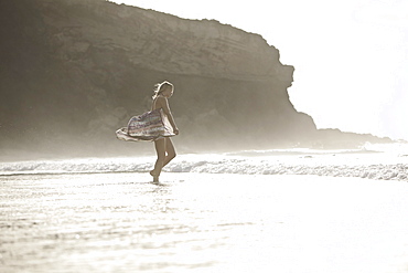 Young woman at beach, Fuerteventura, Spain