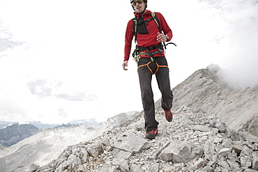 Man hiking along Jubilaeumsgrat, Garmisch-Patenkirchen, Bavaria, Germany