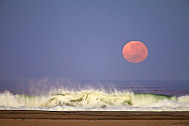 Moon setting along the skeleton coast, Namibia