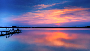 Jetty at sunset on Lake Starnberg, Bavaria, Germany