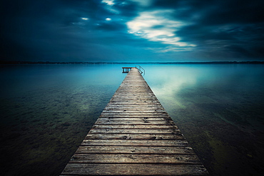 Sunset in bad weather at Lake Starnberg, Bavaria, Germany