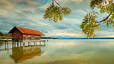 Boathouse at sunset on Ammersee, Bavaria, Germany