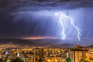 Stormy skies and lightning over a city at night, Cochabamba, Bolivia