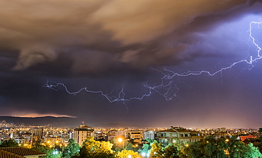 Stormy skies and lightning over a city at night, Cochabamba, Bolivia