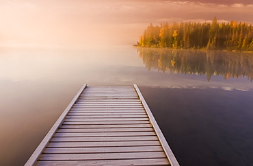 Frost covered dock at sunrise, Glad Lake, Duck Mountain Provincial Park, Manitoba, Canada