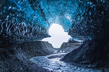 The entrance to a large ice cave in the Vatnajokull Ice cap, Iceland