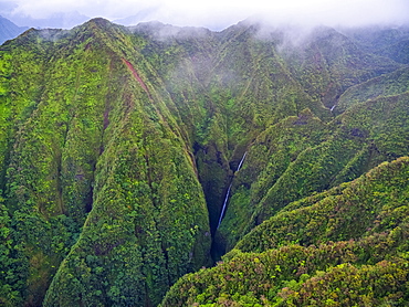 Aerial image of the lush mountains surrounding Oahu, Oahu, Hawaii, United States of America