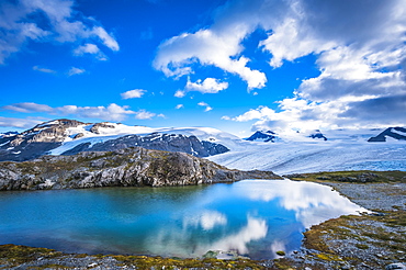 Kenai Fjords National Park and Exit Glacier on a mid-summer day as seen from the Harding Icefield Trail in South-central Alaska, Alaska, United States of America