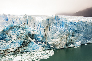 The Perito Moreno Glacier up close showing the blue ice and green water, Cafayate, Santa Cruz Province, Argentina