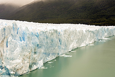 The Perito Moreno Glacier up close showing the blue ice and green water, Cafayate, Santa Cruz Province, Argentina