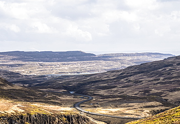 A road winds through the Snaefellsnes Peninsula, Iceland